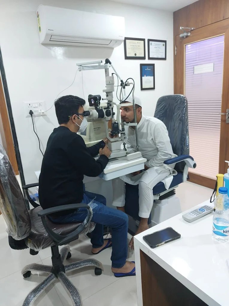 Doctor examining patient with Slit Lamp