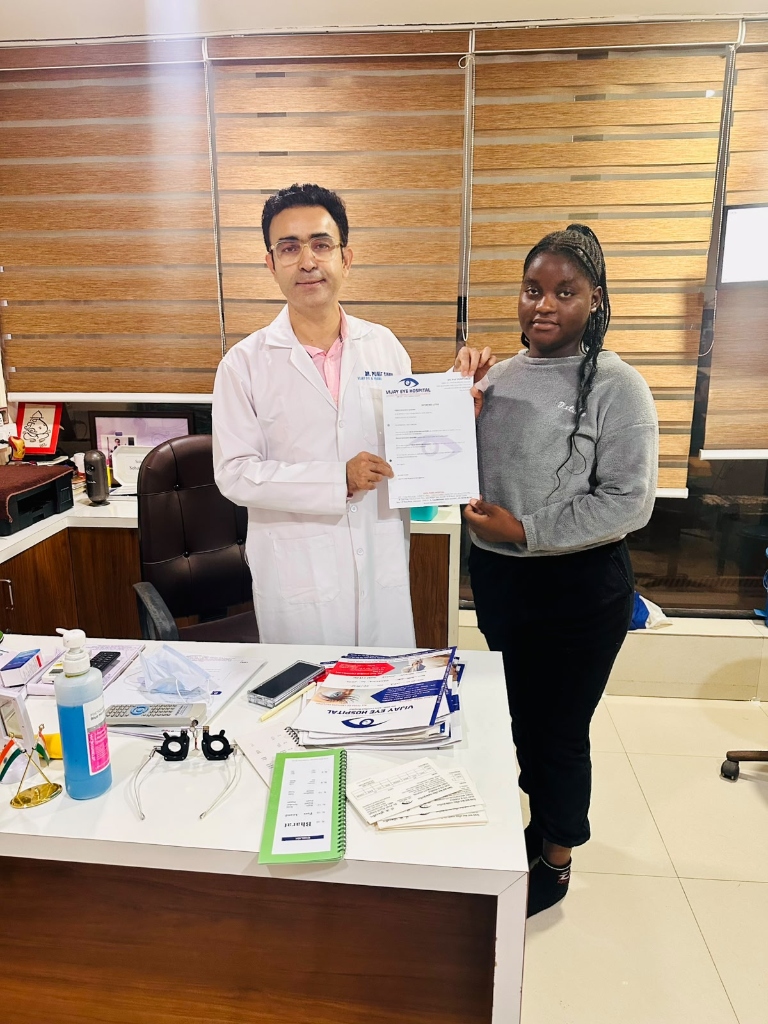 Trainee receiving clinical completion certificate from Dr. Punit Singh
