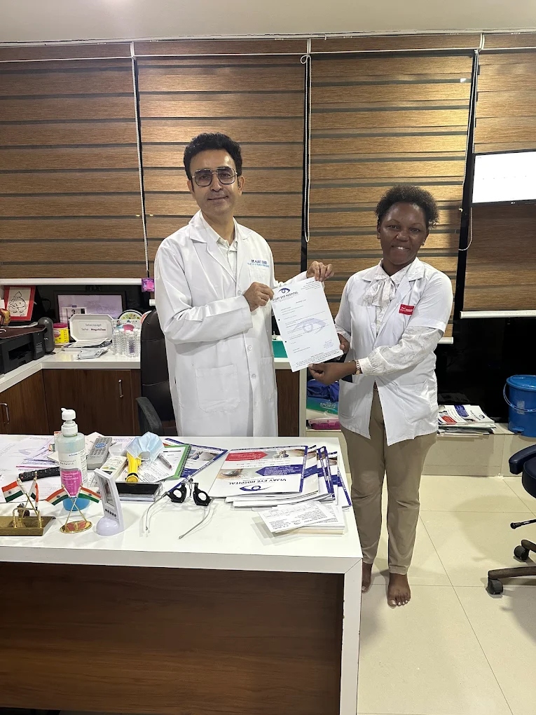 Clinical fellowship trainee receiving certification from Dr. Punit Singh